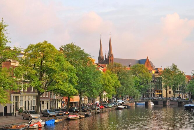 Amsterdam Canal Cruise with Cheese and Wine - A short wooden-boat view of Amsterdam