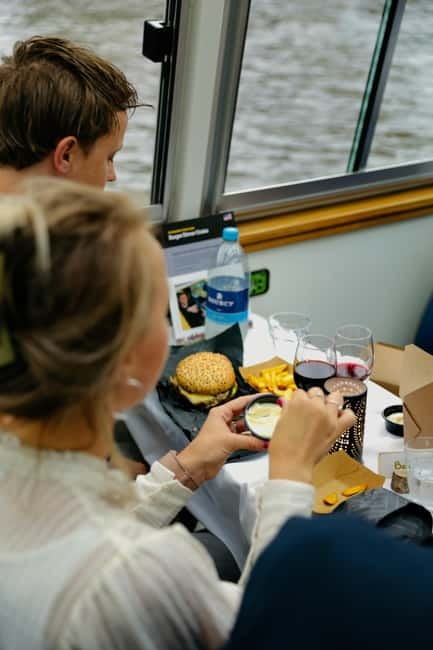 Amsterdam canal cruise with culinary burger or cheese & wine - NEMO, Amsterdam Centraal, and the northern view