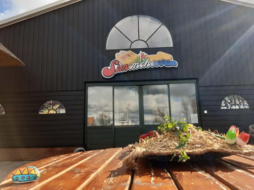 Amsterdam: Cheese, Clogs, Flowers and Windmills Tour - Volendam: a final walk by the water