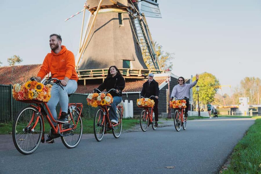 Amsterdam: Cheese Tasting, Windmill & Countryside Bike Tour - The farm stop: cheese, milk, and young animals