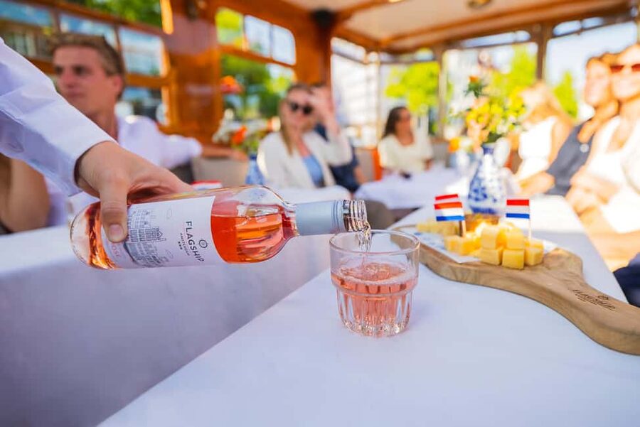 Amsterdam: Classic Saloon Boat Cruise with Cheese & Wine - Why a covered electric boat works well in Amsterdam