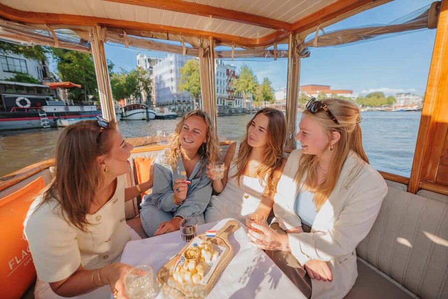 Amsterdam: Classic Saloon Boat Cruise with Cheese & Wine - The Nine Streets and the Golden Bend