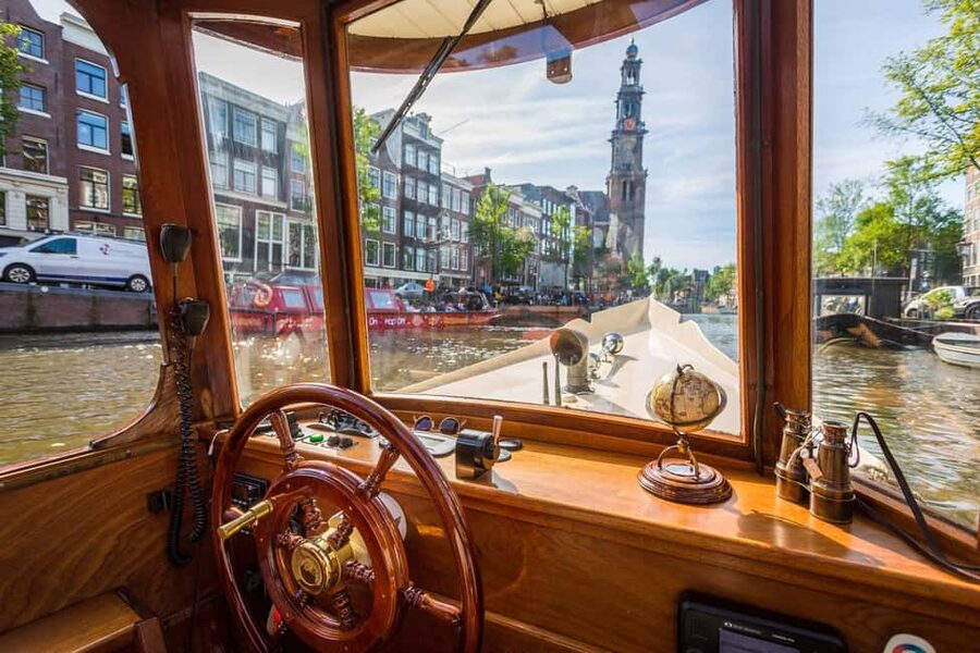 Amsterdam: Classic Saloon Boat Cruise with Cheese & Wine - The Skinny Bridge and the Amstel River