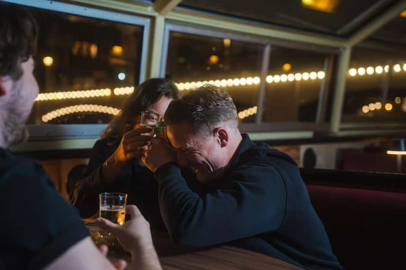Amsterdam: Cozy Cheese & Wine Cruise Tasting Experience - Under the Magere Brug, the cruise’s romantic moment