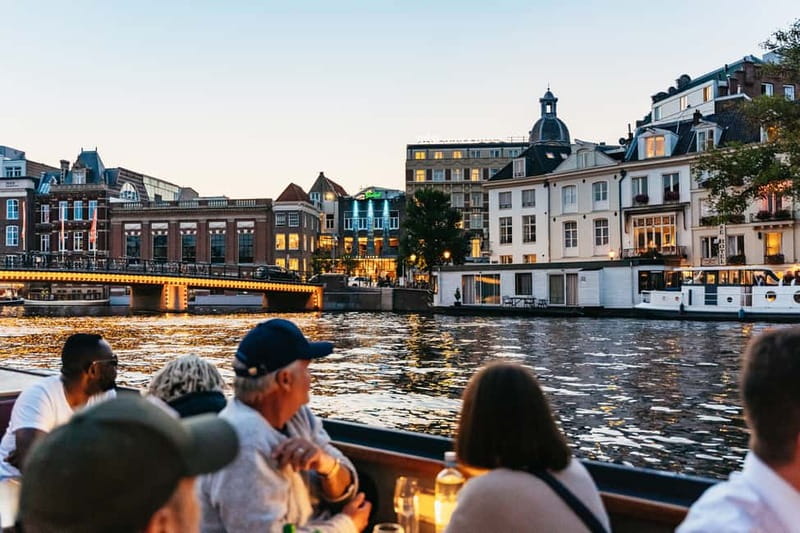 Amsterdam: Cozy Cheese & Wine Cruise Tasting Experience - The cheese, snacks, and drink service