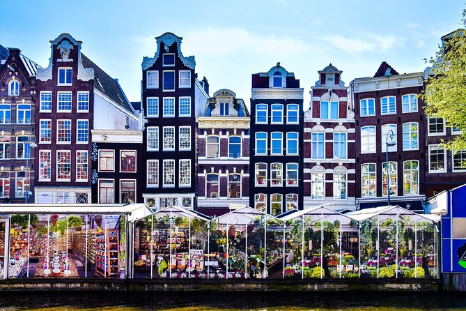 Amsterdam Day Trip from Brussels With Cheese, Clogs and Windmills - Canals, the Red Light District, and the Anne Frank House