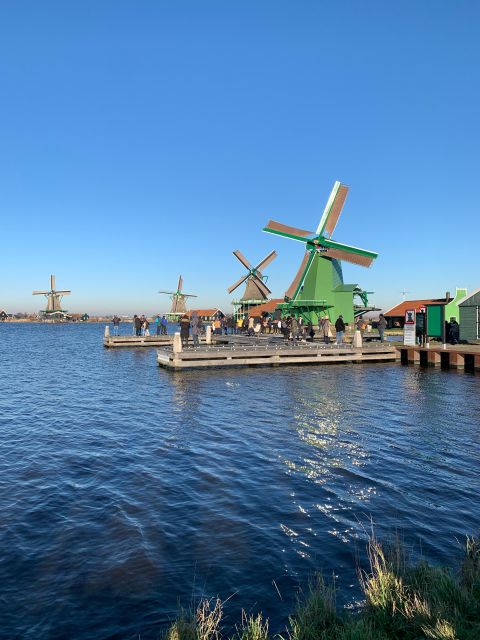 Amsterdam: Guided Zaanse Schans, Windmills & Cheese Tour - Walking among the windmills and merchant houses