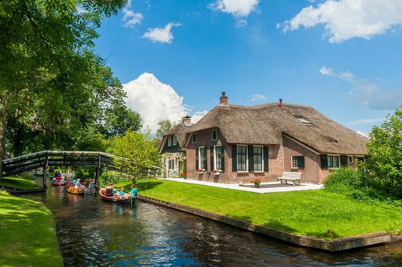 Amsterdam: Live GuideD Giethoorn Boat Tour & Cheese Platter - Leaving Amsterdam by coach