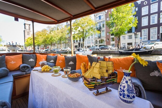 Amsterdam Small-Group Bike Tour With Canal Cruise, Drinks, Cheese - Crossing Amsterdam’s narrow bridge
