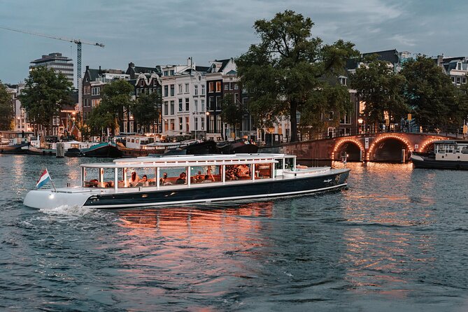 Amsterdam Small-Group Evening Canal Cruise Including Wine, Craft Beer, Cheese - The boat, seating, and group size