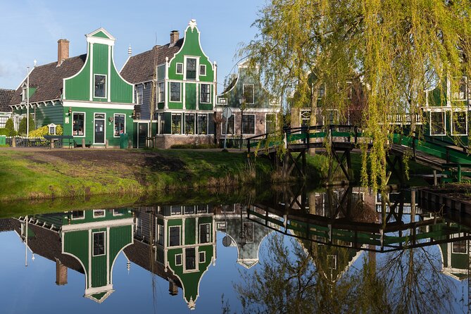 Amsterdam: Windmills, Cheese and Volendam Tour with Video Guide - Volendam: Harbor Views and Free Time