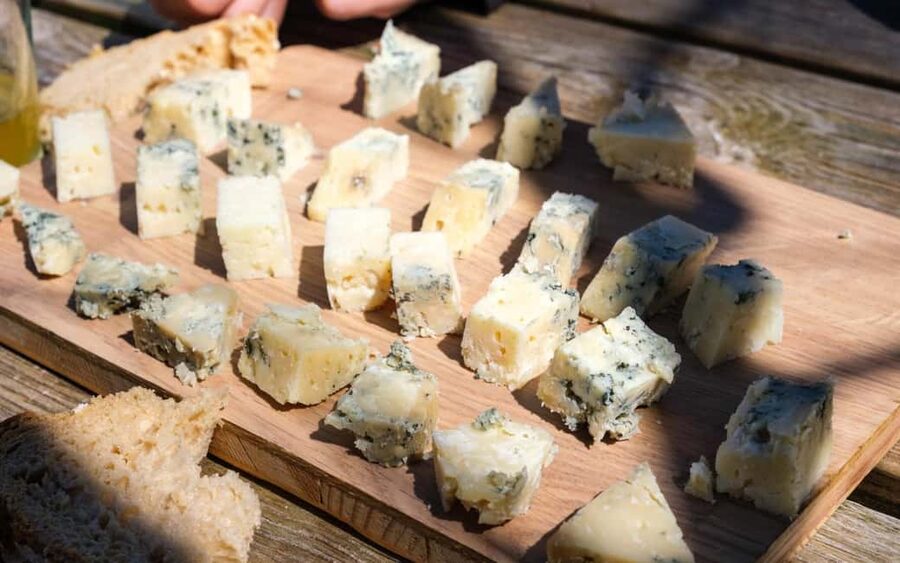 Bulnes: Excursion with funicular and Cabrales cheese cave in the Picos de Europa - Cabrales cheese and Asturian cider at the finish