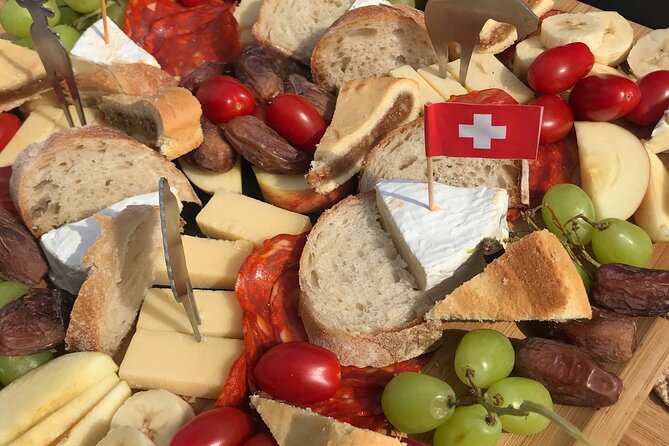 Cheese platter by Boat on Lake Thun, Interlaken - A private outing, with group-size details to check
