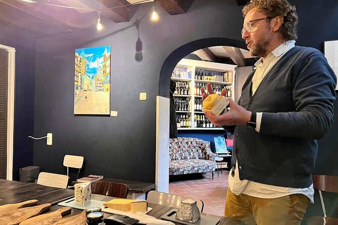 Exclusive Cheese Walk & Dutch Wine Discovery - Passing the Anne Frank House and entering the Jordaan