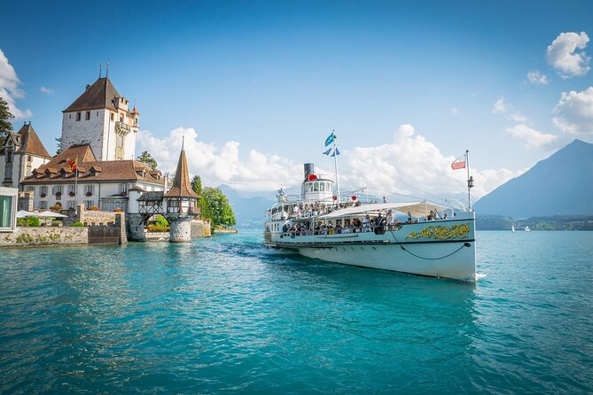 From Basel: Thun Tour, Beatus Caves, Lake Cruise & Cheese - Cruising across Lake Thun