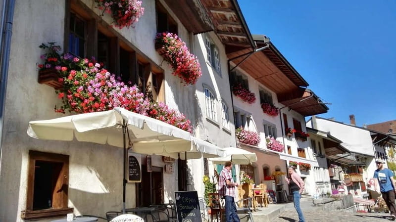 From Geneva: Gruyères Tour with Cheese & Chocolate Factories - The GoldenPass Panoramic train from Montbovon