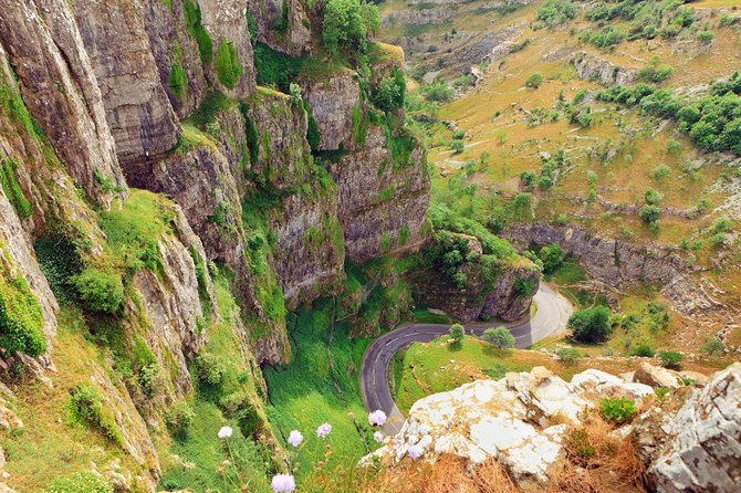 Glastonbury and Cheddar Gorge Guided Day Tour from London - Glastonbury Abbey and the town’s unusual character