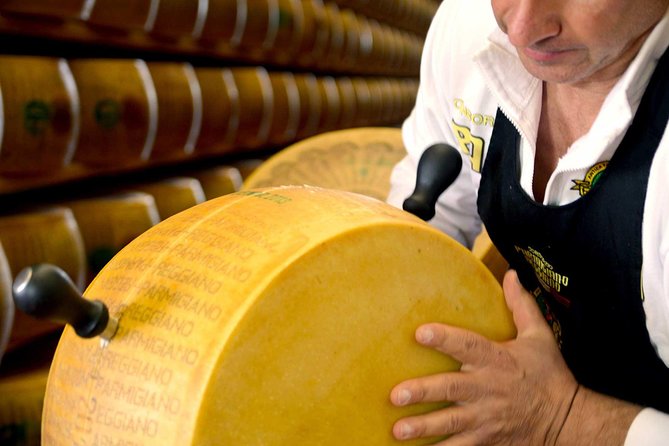 Half Day Private Parmigiano Reggiano and Parma Ham Experience - Torrechiara Castle, a ten-minute photo stop