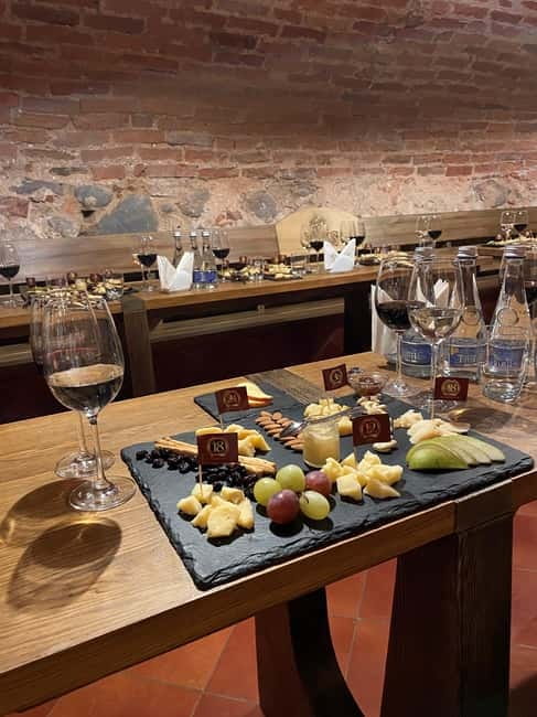 Lithuanian Cheese Tasting & Guided Old Town Tour - Red and white wine with the tasting