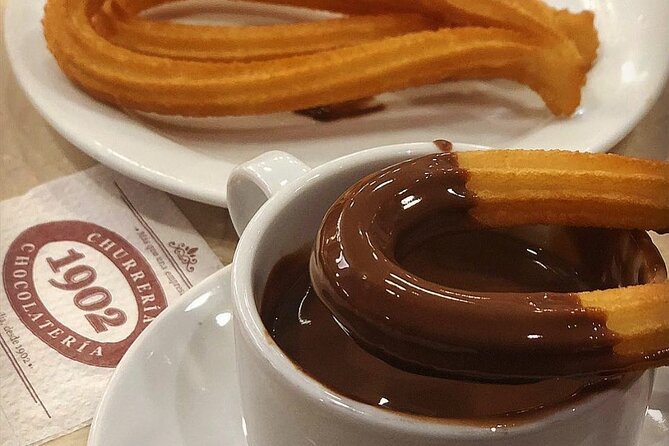 Madrid Bike Tour with Churros and Wine, Ham, and Cheese Upgrade - Plaza Mayor and the old center