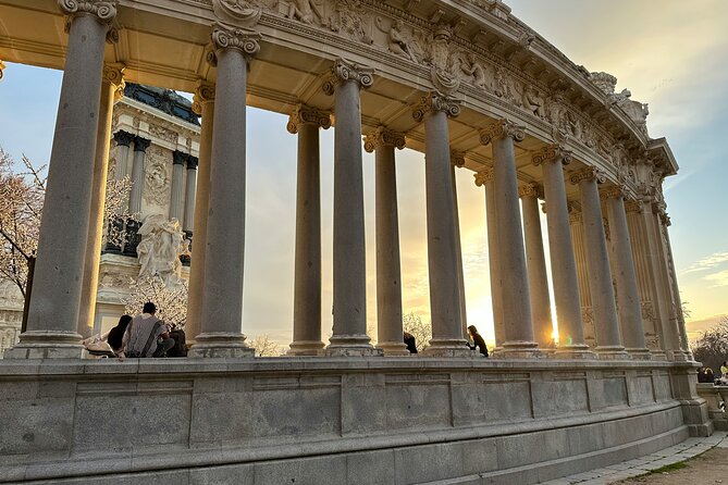 Madrid Bike Tour with Churros and Wine, Ham, and Cheese Upgrade - Entering El Retiro by bicycle