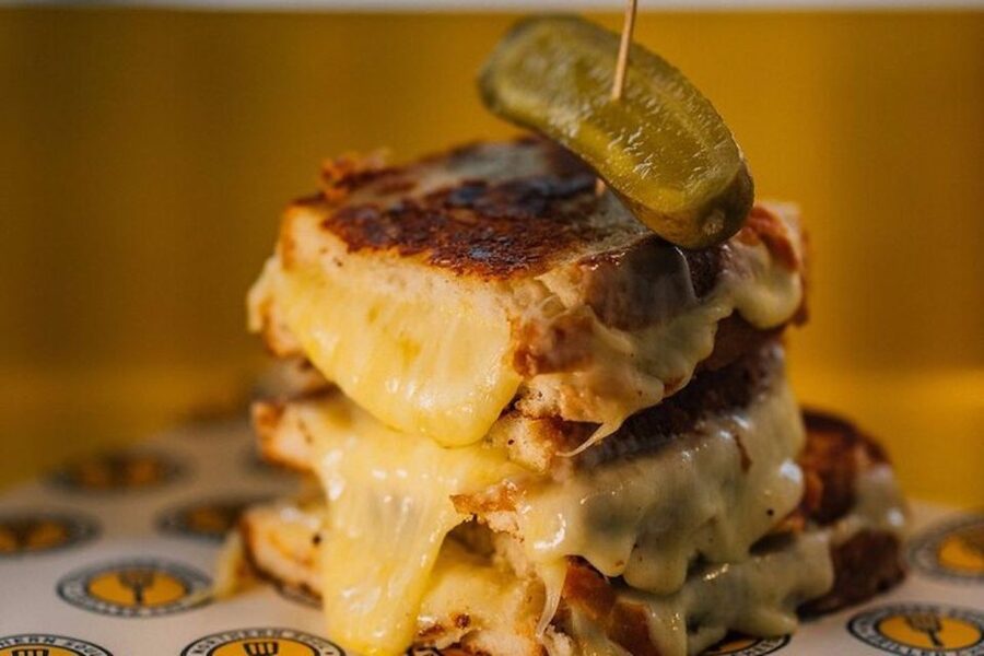 Manchester: Guided Cheese Crawl with Tastings - Tasting cheese with wine and optional extras