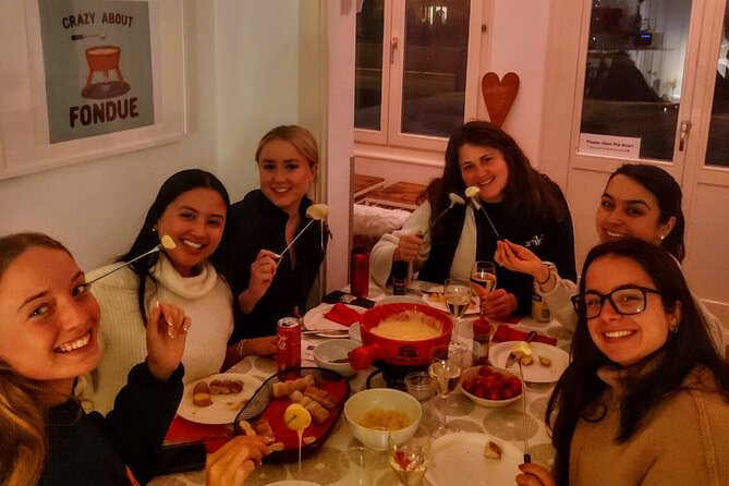 Night Sledding and Fondue Feast Interlaken - Sleds, torches, and winter clothing