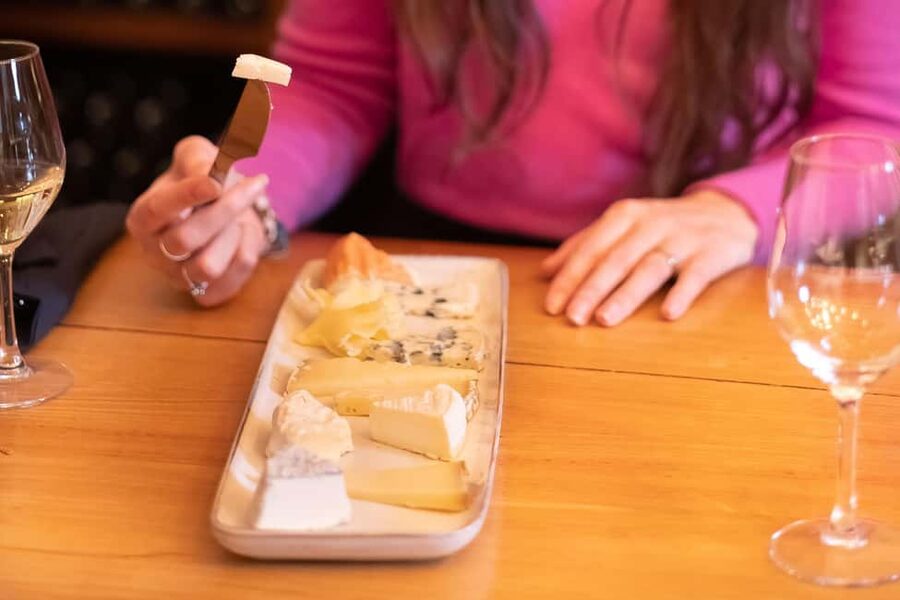Paris: 10 Wines & 10 Cheeses tasting in French - Inside the Caves du Louvre, a royal wine setting