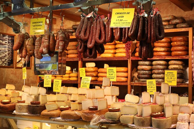 Paris Marché d’Aligre Walking Tour with Chocolate and Cheese Tasting - The indoor food hall and French shopping culture