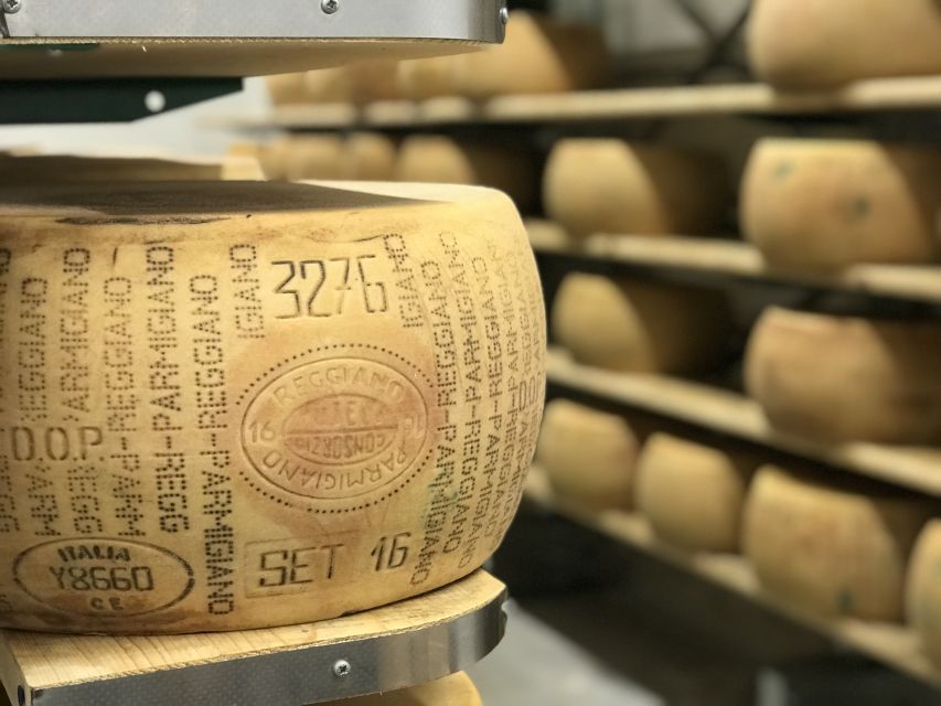 Parma: Parmigiano-Reggiano Tour and Tasting - Copper vats and the first stage of the cheese