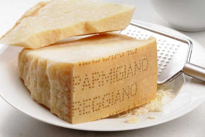 Parmigiano-Reggiano Cheese Factory Small group Tour From Parma - Inside the casello, where the cheese begins