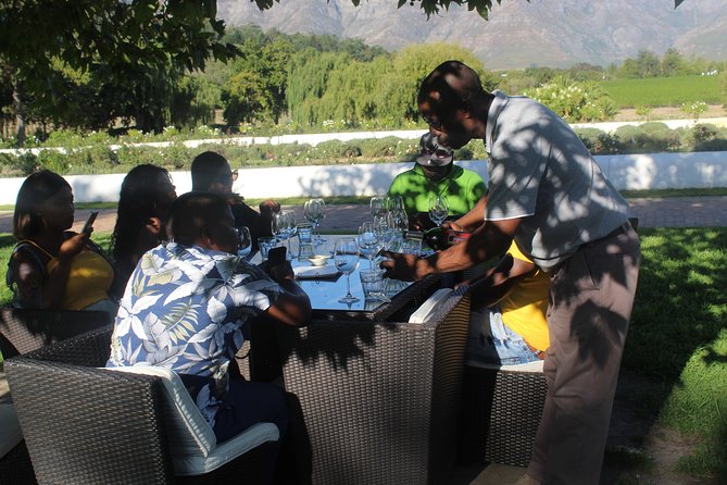 Shared Tour To The Wineries Stellenbosch Paarl + Cheese Tasting from Cape Town - Babylonstoren, gardens and mountain views