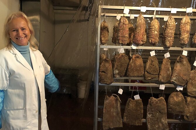 Small Group Reggio Half-Day Food & Wine Tour with Local Producers - The possible third stop: salami, vineyards, and Lambrusco