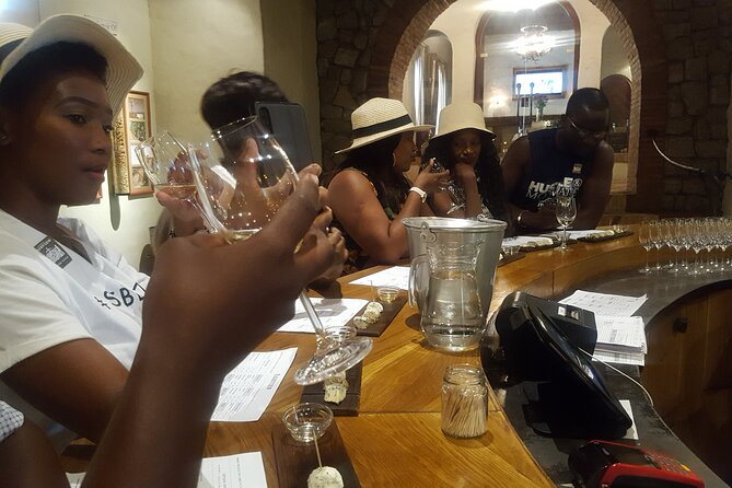 Stellenbosch Franschhoek Full-Day Tour with Cheese Tasting - Wine, cheese, bakery treats, and dried meat