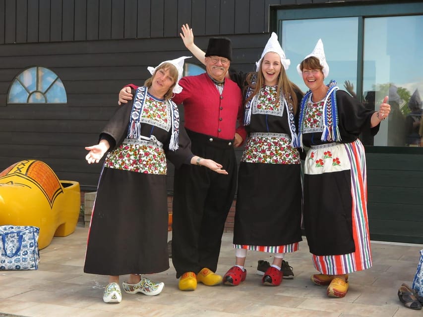 Volendam: Traditional Costume Photo with Cheese & Clog Tour - Seeing a block of wood become a clog
