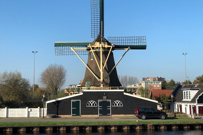 Windmill, Dairy Farms & Countryside Electric Bike Tour - The return through Amsterdam Noord