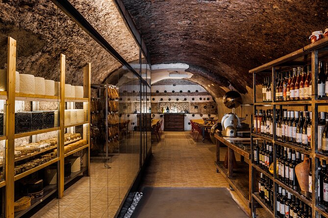 Wine Tasting Cold cuts and Rare Cheeses in Grotta a Testaccio - Entering Testaccio’s Urban Aging Cave