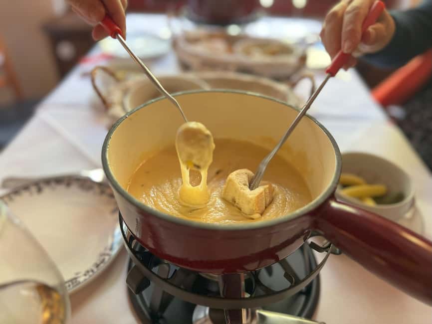 Zurich: Food Tour of 8+ Tastings with Cheeses & Chocolates - Zurich sausage, sauerkraut, and mustard