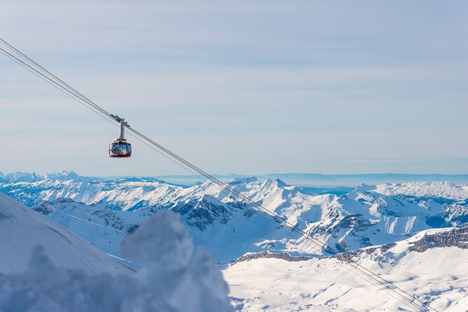 Zurich to Lucerne and Titlis Tour with Igloo Fondue Experience - Riding the Titlis Rotair to the summit